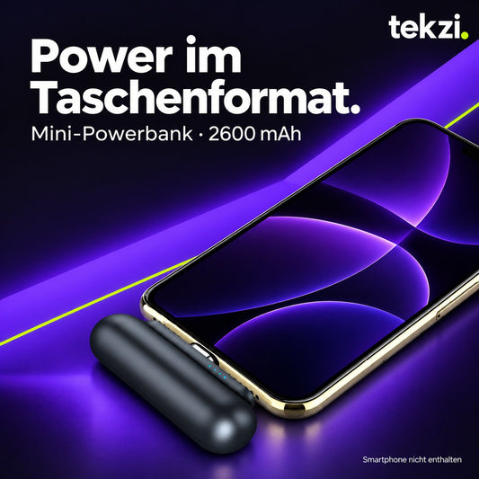 Schwarze Mini-Powerbank 2600 mAh am Smartphone – Smartphone nicht enthalten, im TEKZI-Design